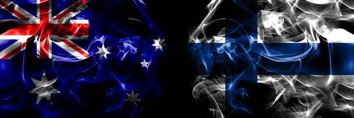 Flags of Australia, Australian vs Finland, Finnish. Smoke flag placed side by side on black background