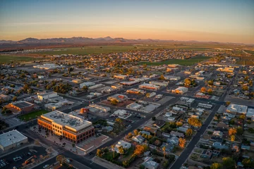 Acrylglasbilder Arizona Aerial View of Sunrise over the Phoenix Suburb of Buckeye, Arizona  © Jacob