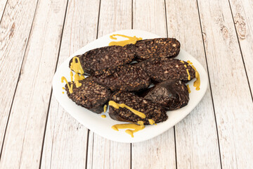 Burgos blood sausage is a sausage based on pork blood typical of Burgos gastronomy. To the...