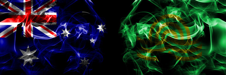 Flags of Australia, Australian vs Japan, Japanese, Shinshinotsu, Hokkaido, Ishikari, Subprefecture. Smoke flag placed side by side on black background