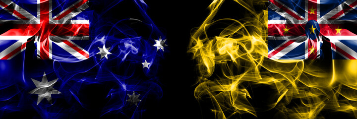 Flags of Australia, Australian vs New Zealand, Niue. Smoke flag placed side by side on black background