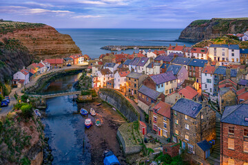 Fototapeta na wymiar Staithes is a seaside village in the Scarborough Borough of North Yorkshire, England. Captain Cook lived and worked here as a grocer's apprentice.