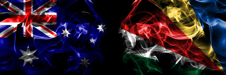 Flags of Australia, Australian vs Seychelles, Seychellois. Smoke flag placed side by side on black background