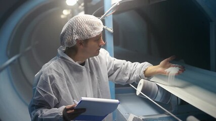 Sugar Refinery Quality Control Inspector Checking Process Of Sugar Refining. Refined Sugar Production. Refined Sugar Moves Along A Conveyor Belt At The Sugar Refinery.