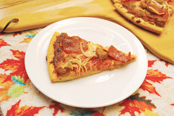 A Slice of Pepperoni and Onion Pizza Pie