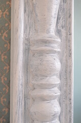 the mirror frame is painted white