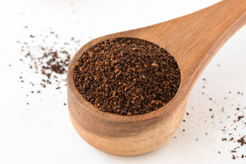 Ground Coffee in a Wood Scoop