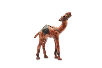 camel figurine. handmade. made from genuine leather. is isolated on a white background. close-up....