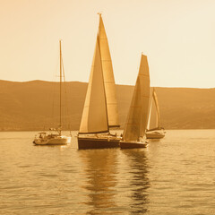 Sailboats on water. Montenegro. Travel concept.  Sepia toning