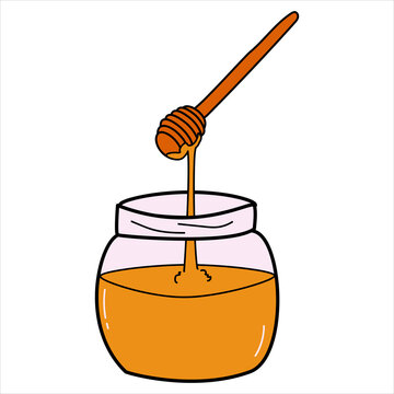 A jar of honey with a wooden spoon