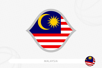 Malaysia flag for basketball competition on gray basketball background.