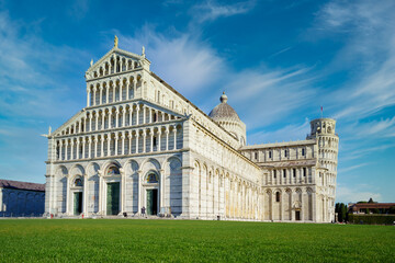 Fototapeta premium Piazza dei Miracoli - Pisa, Italy, January 2021: Cathedral medieval Roman Catholic Assumption of the Virgin Mary in Piazza dei Miracoli and Pisa leaning tower