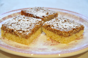 Home made sweet hazelnut and caramel cubes. Hazelnut cubes with nuts, staff sugar and chocolate chunks