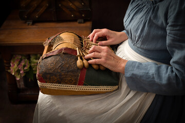 Obraz premium Medieval woman making lace