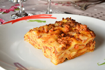Traditional homemade italian Lasagna with ragù bolognese and béchamel sauce. Six layers.