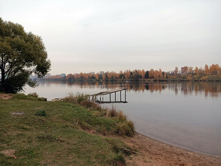 Pier on the autumn river