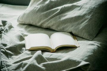 open book on the bed