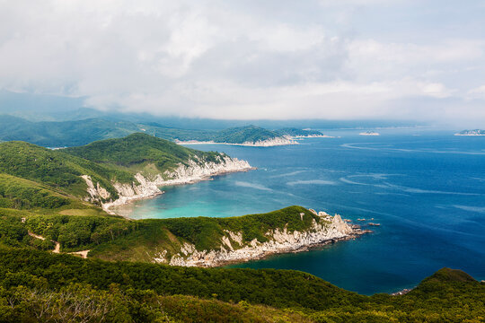Scenic view of the Far Eastern Russian coast of the Sea of Japan with mountains and bays on a sunny summer day