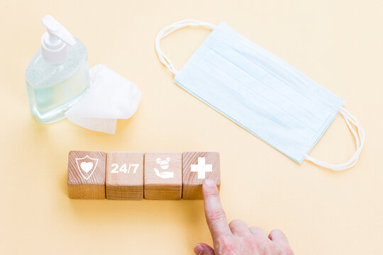 Doctor hand arranging wood block stacking with healthcare icons, insurance can your health.