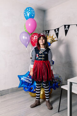 full-length girl dressed as a pirate at her eighth birthday party