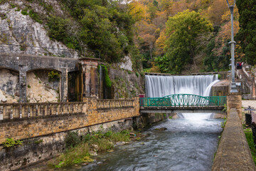 Fototapeta na wymiar New Athos waterfall is a popular attraction of Abkhazia. Built by hand by the monks of the Orthodox Simono-Kananitsky monastery in the 19th century