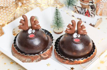 Chocolate cake deer in a white tray.