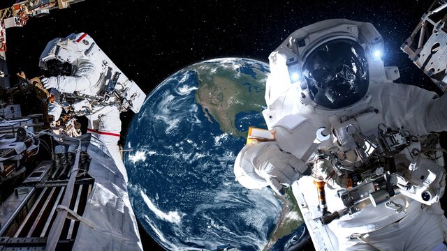 Astronaut spaceman do spacewalk while working for spaceflight mission at space station . Astronaut wear full spacesuit for operation . Elements of this image furnished by NASA space astronaut photos .