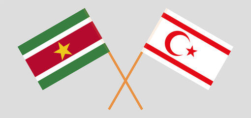 Crossed flags of Suriname and Northern Cyprus. Official colors. Correct proportion