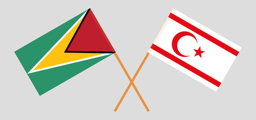Crossed flags of Guyana and Northern Cyprus. Official colors. Correct proportion