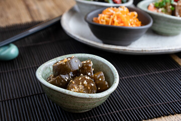 Japanese pickled cucumber salad with sesame seeds.