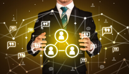 Hand holding social media icons