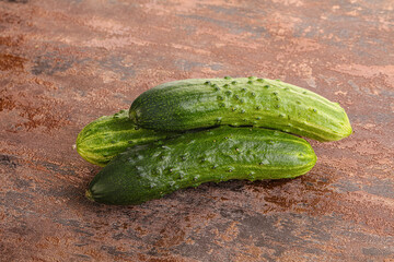 Fersh juicy green cucumbers heap