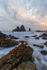 Wave water flowing around Camel Rock, NSW, Australia.