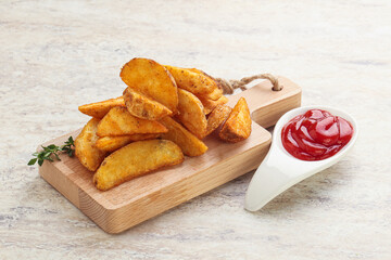 Fried rustic potato with tomato ketcup