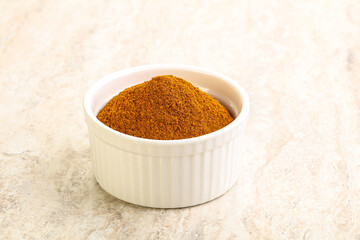 Dry Paprika powder in the bowl