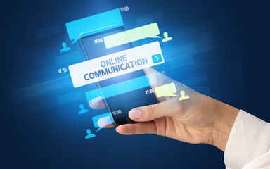 Hand using smartphone with social media concept