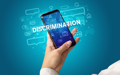 Hand using smartphone with social media concept