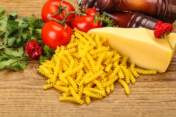 Raw Italian pasta Fusilli for cooking