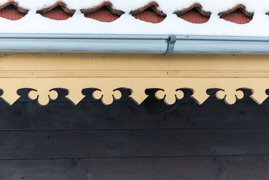 Wood carvings for the building under the gutter
