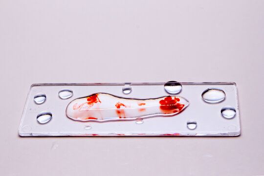glass with contaminated solution on top white background