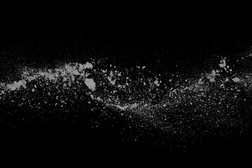 White powder explosion on black background. Colored cloud. Colorful dust explode. Paint Holi.