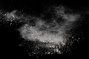 White powder explosion on black background. Colored cloud. Colorful dust explode. Paint Holi.