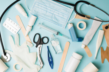 Hospital medical items on a blue background