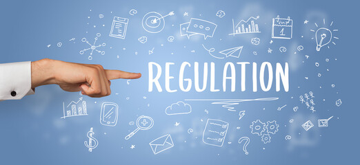 Close-Up of cropped hand pointing at business inscription