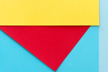 yellow, red, and blue paper background