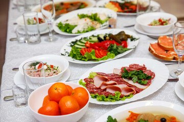 Banquet table with various dishes.