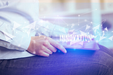 Close up hands using tablet