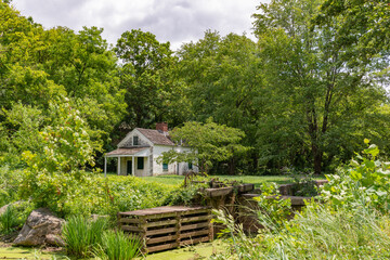 The C & O Canal, at Chesapeake & Ohio Canal National Historical Park, Maryland. Lock house at Lock...