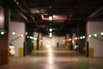 Blurred view of modern car parking garage