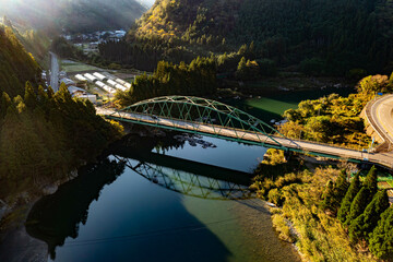 Mountain River Bridge in Countryside of Gujo, Gifu Japan. Aerial Sunrise Shot